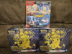 Pokemon Surging Sparks 2 ETBs and 1 Booster Bundle Factory Sealed - Image 1