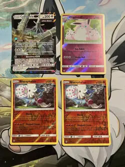 Pokemon TCG SM Unbroken Bonds Lot Of 14 Cards That Come In A Mini Album - Image 1