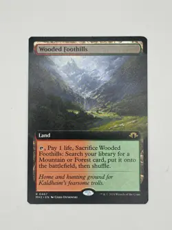 Wooded Foothills (Extended Art) Modern Horizons 3 Regular NM MTG - Image 1