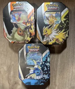 Pokemon Eevee Evolutions Tin Bundle - Flareon V, Vaporeon V, Jolteon V - Sealed 820650809057 - Image 1