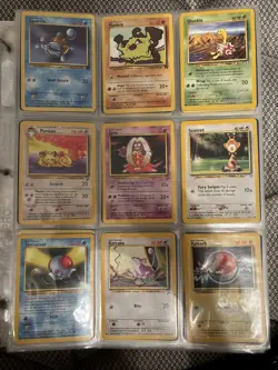White binder full of Pokemon, Yu-Gi-Oh, and WotC cards. - Image 4