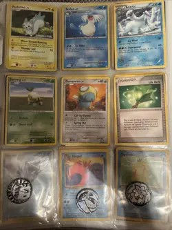 White binder full of Pokemon, Yu-Gi-Oh, and WotC cards. - Image 5