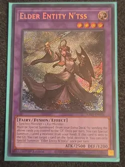 YuGiOh! - Elder Entity N'tss RA01-EN026 Secret Rare 1st Edition Near Mint - Image 1