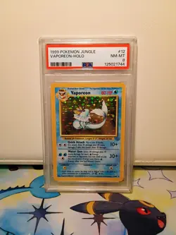 1999 Pokemon TCG Vaporeon Jungle Holo Unlimited Rare Card 12/64 PSA NM-MT 8 - Image 1