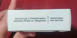 MTG Secret Lair X Transformers: Optimus Prime Vs. Megatron - Traditional Foil - Image 1