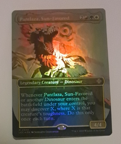 Pantlaza, Sun-Favored Borderless FOIL NM Magic the Gathering Caverns lxalan MTG - Image 1