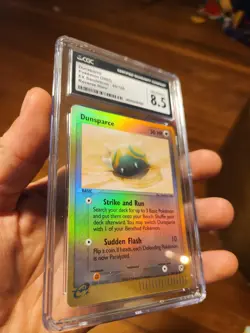 CGC 8.5 NM/MINT+ Dunsparce Reverse Holo 60/100 EX Sandstorm Pokemon - Image 1