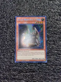 Yugioh! Reactan, Dragon Ruler of Pebbles BLMM-EN121 Secret Rare 1st Edition NM - Image 1