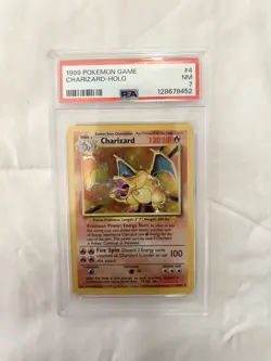 1999 POKEMON BASE SET UNLIMITED #4 CHARIZARD-HOLO PSA 7 - Image 1
