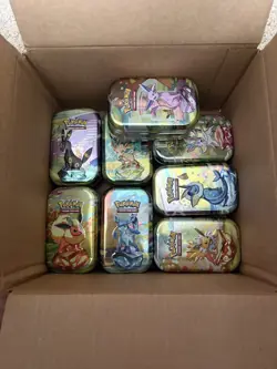 EMPTY Pokemon Prismatic Evolutions Mini Tins - Set of 8 With Coins & Art Cards - Image 1