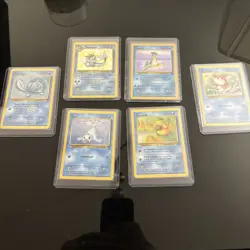 Vintage Pokemon Cards Including Holo Vaporeon And Lapras - Image 1