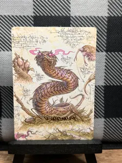 MTG TCG: Rottenmouth Viper 36/54, Burburan, (Gold-Stamped) Bloomburrow _ ART - Image 1
