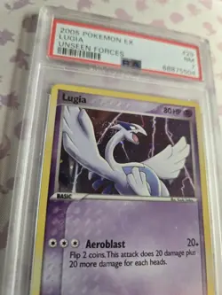 2005 POKEMON EX UNSEEN FORCES COSMOS #29 LUGIA-HOLO PSA 7 SWIRL - Image 3
