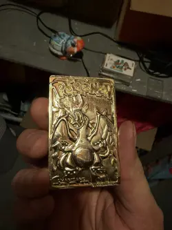NINTENDO CHARIZARD LIMITED EDITION 23K GOLD PLATED TRADING CARD In hard cover - Image 1