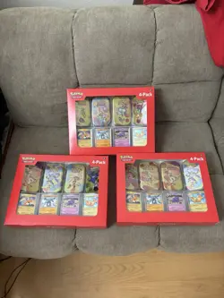 3 Pokemon 151 -Mini Tins 4 Pack. Sam’s Club Exclusive, Each Tin Has Two Packs - Image 1