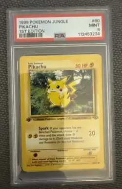 1999 Pokemon Jungle Regular 1st Edition Pikachu 60/64 PSA 9 - Image 1