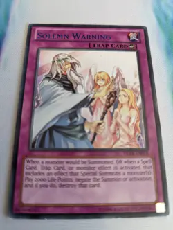 YuGiOh! Solemn Warning DL18-EN019 Duelist League Rare Purple LP - Image 1