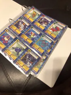 Collection Of Digimon Cards In Binder With Protective Sleeves - Image 1