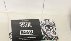 MTG Secret Lair Marvel Spider-Man: Mana Symbiote Sealed Raised Foil SLD In Hand - Image 1