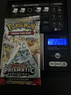 22.49g VERY HEAVY Prismatic Evolutions Pokemon Sealed Booster Pack New - Image 1
