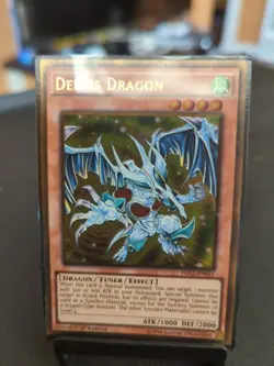Yu-Gi-Oh Debris Dragon Gold Rare Card PGL2-EN031 1st Edition - Image 1
