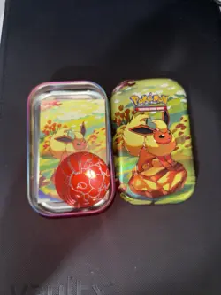Pokemon TCG: Scarlet & Violet-Prismatic Evolutions Mini Tin - Flareon (Empty) - Image 1