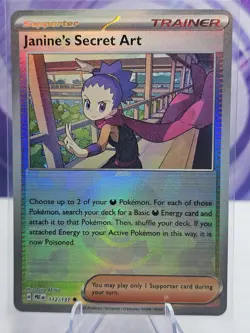 JANINE'S SECRET ART 112/131 PRISMATIC EVOLUTIONS POKEMON (POKE BALL HOLO, NM) - Image 1