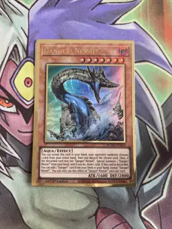 MGED-EN019 Danger! Nessie Gold Rare 1st Edition NM Yugioh Card - Image 1