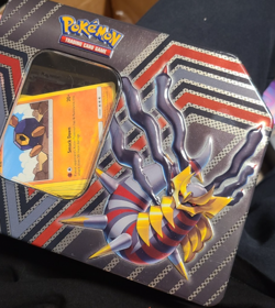 Pokemon Tins With Random Assortment Of Cards - Image 1