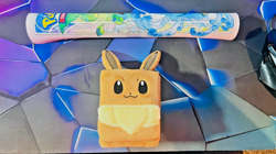 Pokemon Prismatic Evolutions SPC Eeveelutions Playmat & Eevee Deck Box - Image 1