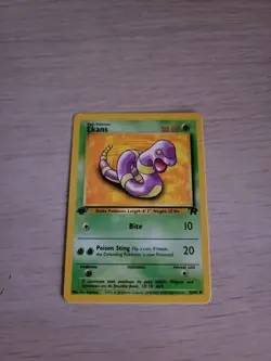 Pokemon Team Rocket 1st Edition Regular Finish Ekans 56/82 LP-NM OC717 - Image 1