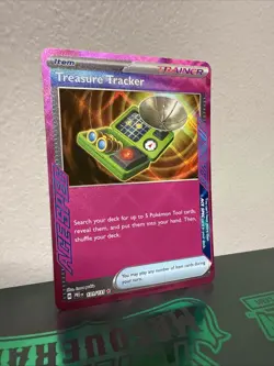 TREASURE TRACKER 131/131 PRISMATIC EVOLUTIONS POKEMON (ACE SPEC, NM) - Image 1