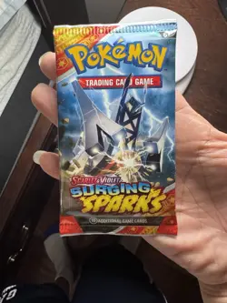 Pokemon TCG Surging Sparks Factory Sealed Booster Pack HEAVY! - Image 1