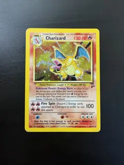 Charizard 4/130 Holo Rare Base Set 2 Pokemon Card DMG - Image 1