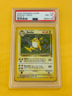 2000 Pokemon Base Set 2 Raichu Holo #16/130 PSA 8 - Image 1