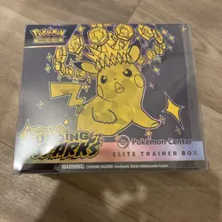 Pokemon Surging Sparks Elite Trainer Box ETB Pokemon Center Sealed (tiny rip) - Image 1