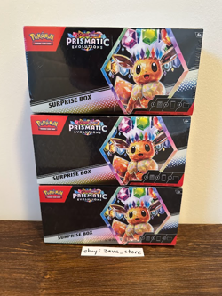 Pokemon TCG Prismatic Evolutions Surprise Box - New & Sealed - Lot of 3 (1 tear) - Image 1