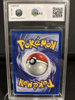 CARTA POKEMON HITMONLEE FOSSIL 1ST ED 007 GRAAD 8 NM-MT ITA HOLO - Image 2