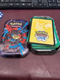 80x Pokemon Trading Card Game Live Mega Evolution Code Cards plus tin - Image 1