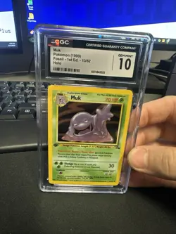 [CGC 10 GEM MINT] 1ST EDITION Muk 13/62 Fossil Holo Pokemon Tcg (2000) - Image 1
