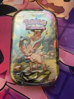 Pokemon TCG Prismatic Evolutions Leafeon Mini Tin Sealed New - Image 1