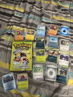 Pokemon Card Lot of 16 - Mixed Variety of Sets, And Pokemon Adventures Manga - Image 1