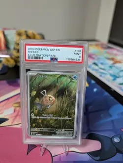 Pokemon en Surging Sparks Feebas Illustration Rare IR 198/191 PSA 9 - Image 1
