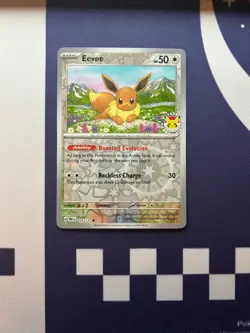 Eevee - (Pokemon Day 2025) (Reverse Cosmos Holo) 074/131 Miscellaneous Cards & P - Image 1