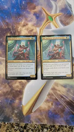 MTG OTJ Doc Aurlock Grizzled Genius 0201 Non/Foil Set NM - Image 1