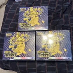 Lot Of 3 Surging Sparks ETB elite trainer box Pokemon - Factory Sealed - Image 1