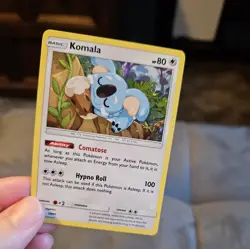 Komala SM41 Holo Sun & Moon Black Star Promo Pokemon Card - Image 1