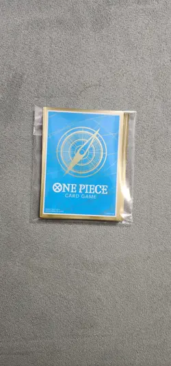One Piece Card Game 10 count sleeves Blue Gold Limited Edition - Image 1