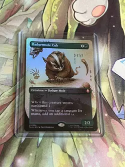 [NM] Magic the Gathering Badgermole Cub (Borderless Foil) [M 0326] - Image 1
