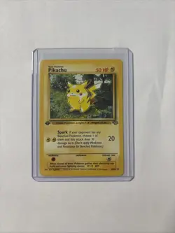 Pokemon Pikachu 60/64 Base Set 1st Edition w/ Top Loader - Image 1